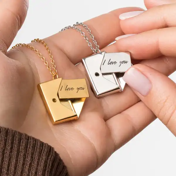 hearts_valley_love_letter_hand_gold_silver_1.webp